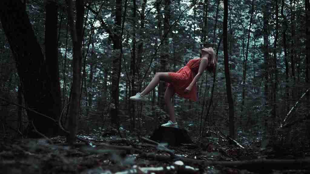 levitation, young woman, red dress