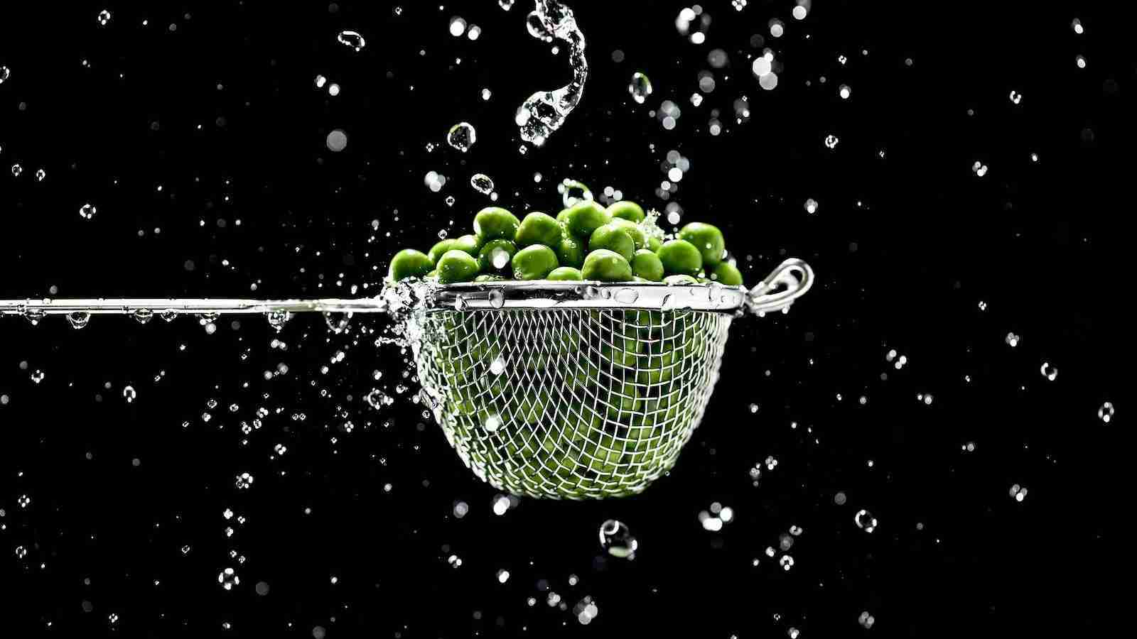 Green Fruits in Strainer