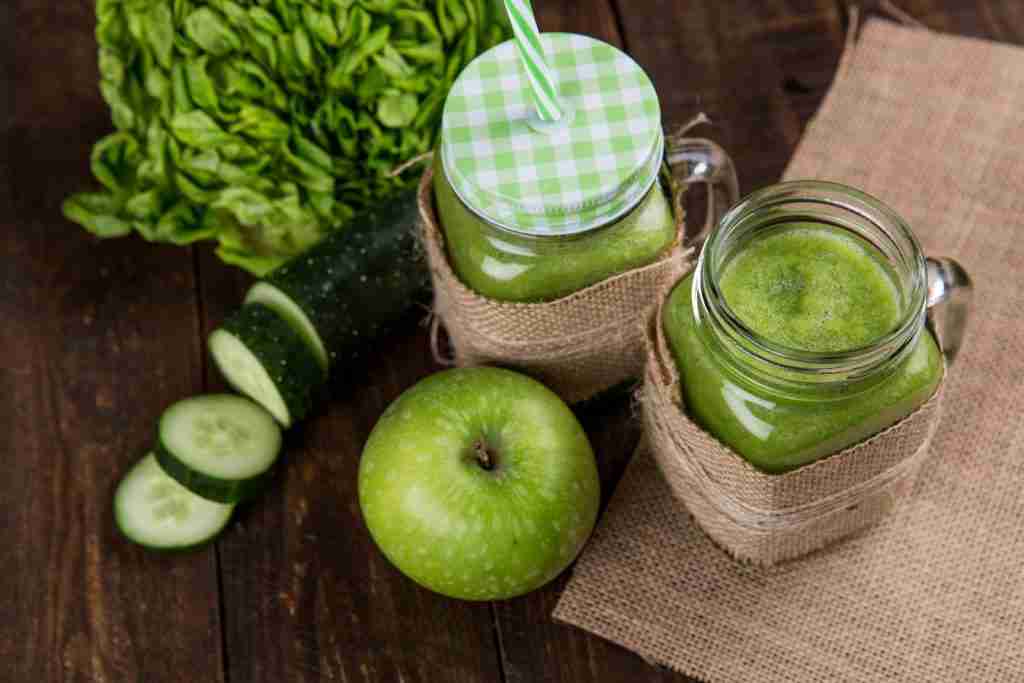 Cucumbers with a glass jar and an apple - Fun Facts About Cucumbers.