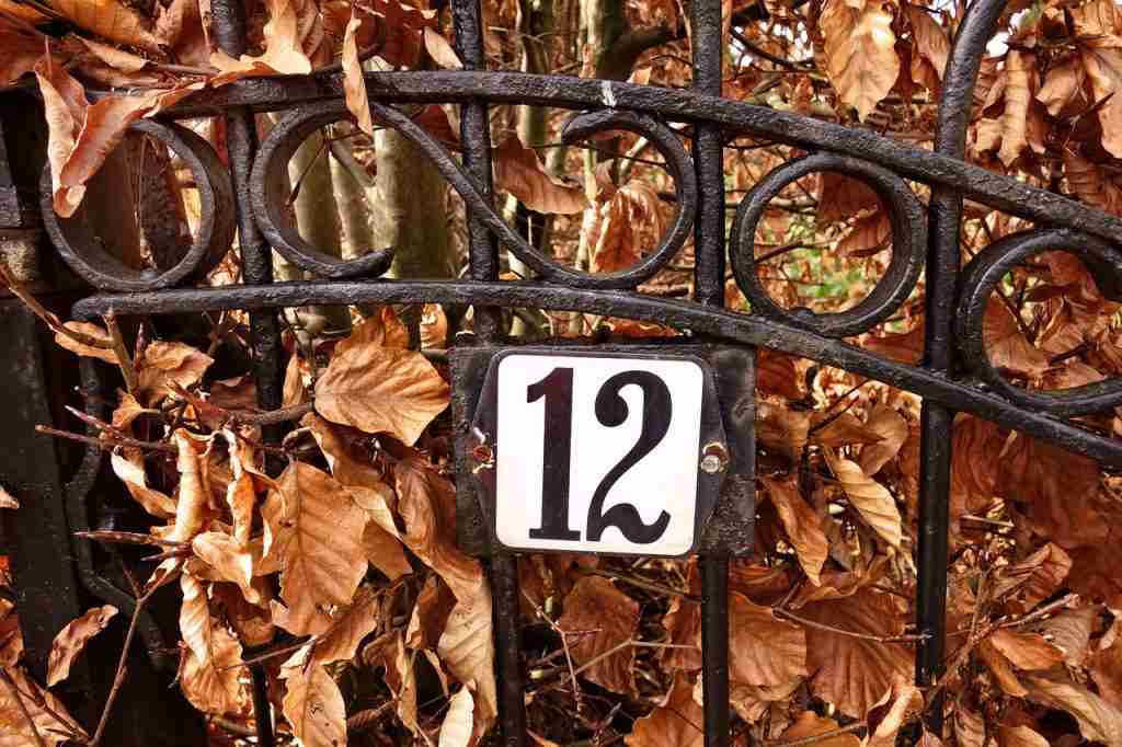 gate, wrought iron with number 12 on it