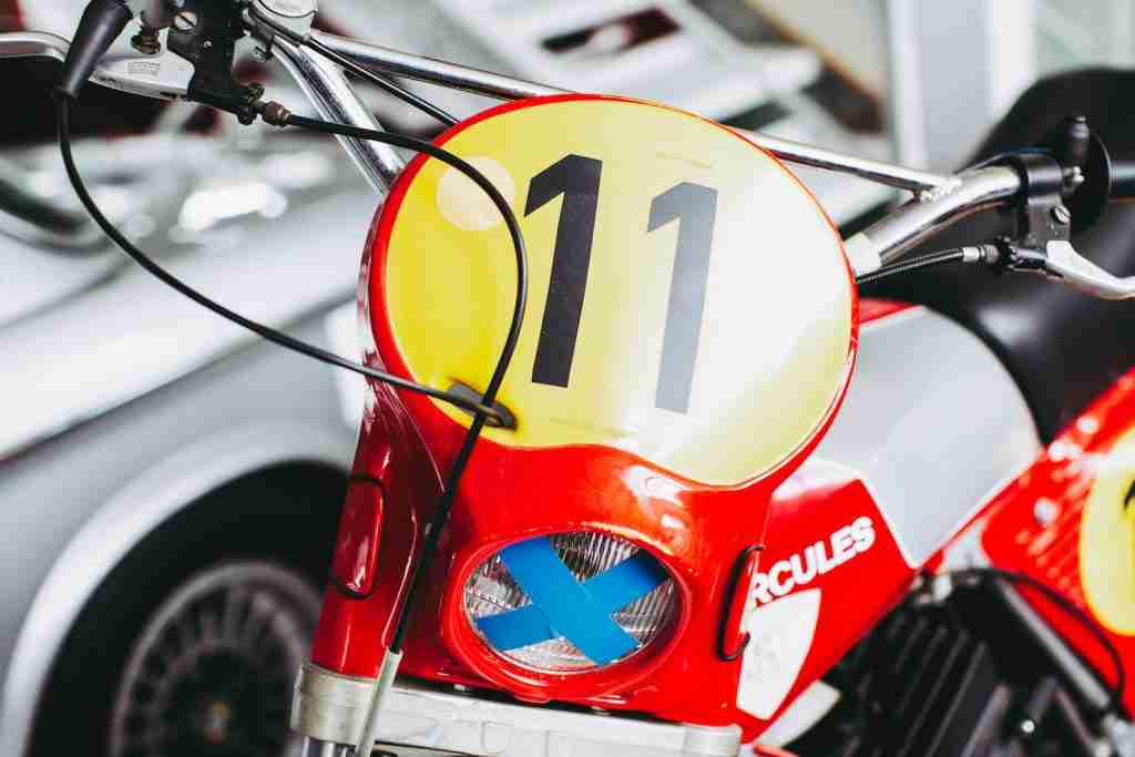 red and yellow motorcycle with 11 number wriiten on it : Fun Facts About Number 11