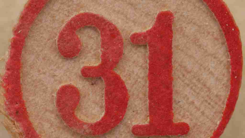 Number 31 written on wood