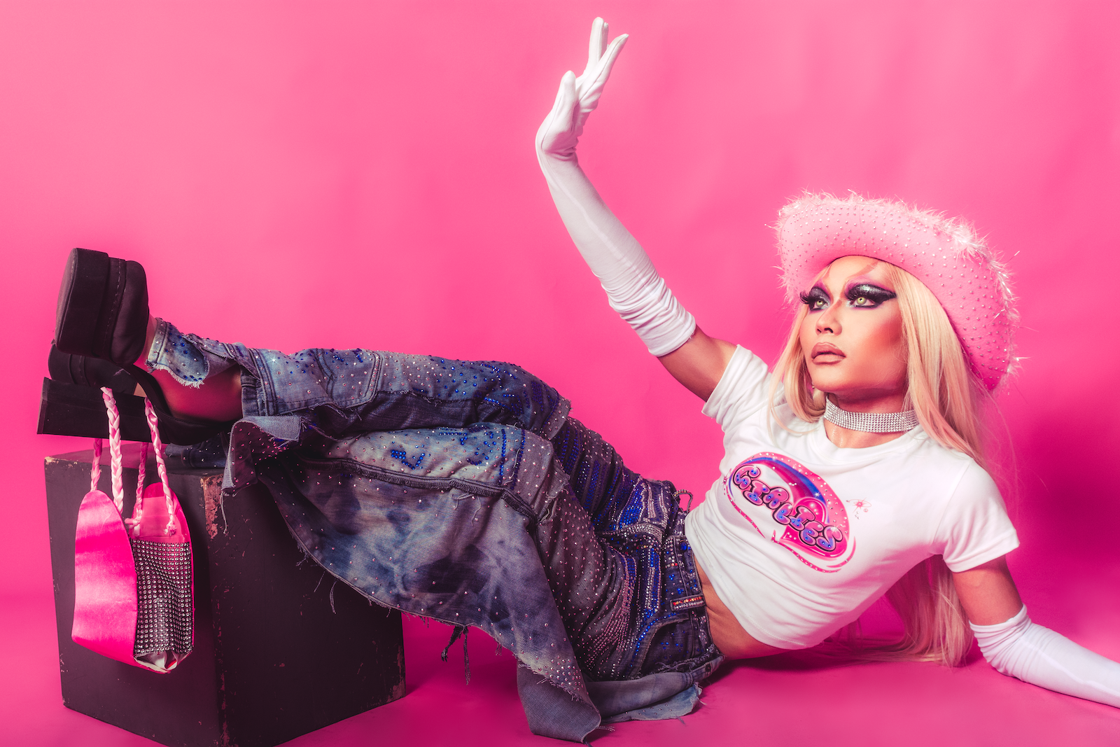 Woman in Glamour Makeup Wearing a Pink Fluffy Hat