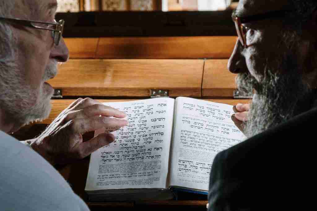 Bearded Men Holding a Book