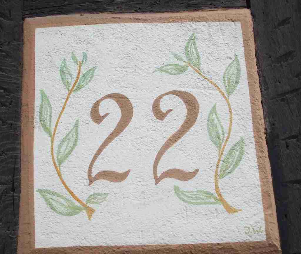 Image of 22 number written on a frame : fun facts about number 22