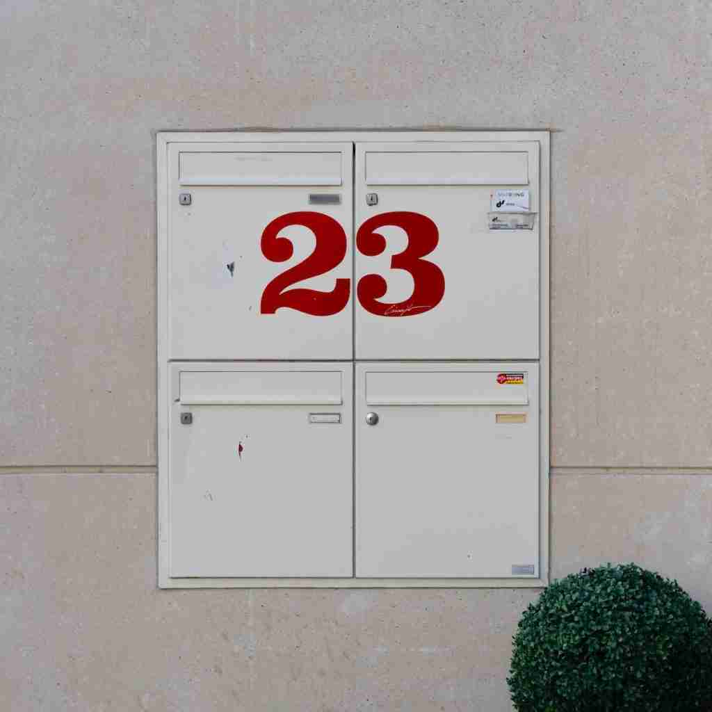 white and red number 23 wall decor