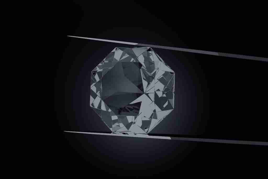 a black and white photo of a diamond