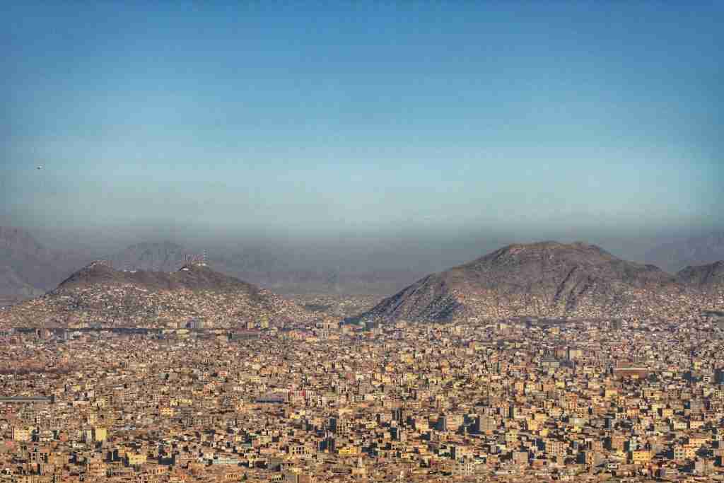 a view of kabul city with mountains in the background : Fun Facts About Afghanistan