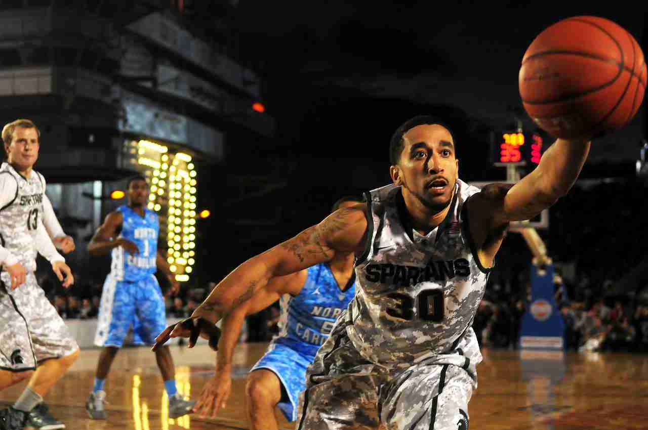 basketball player grabbing ball