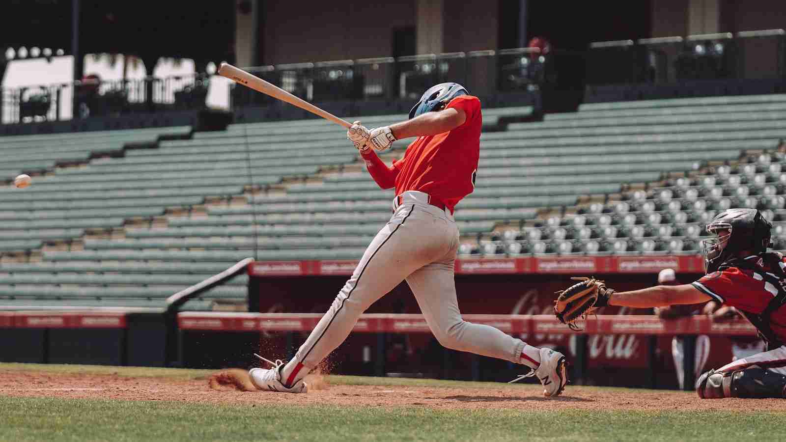 Player hitting baseball