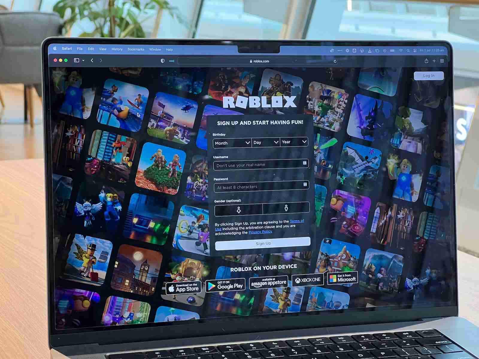 a laptop with UI of Roblox