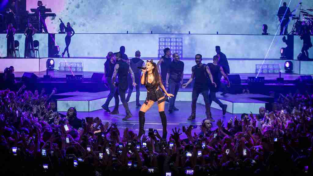 singer singing in a concert : Fun Facts About Ariana Grande