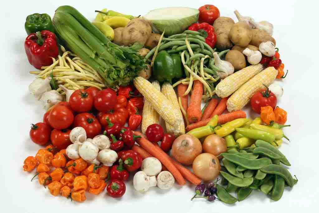 different types of vegetables on a white surface