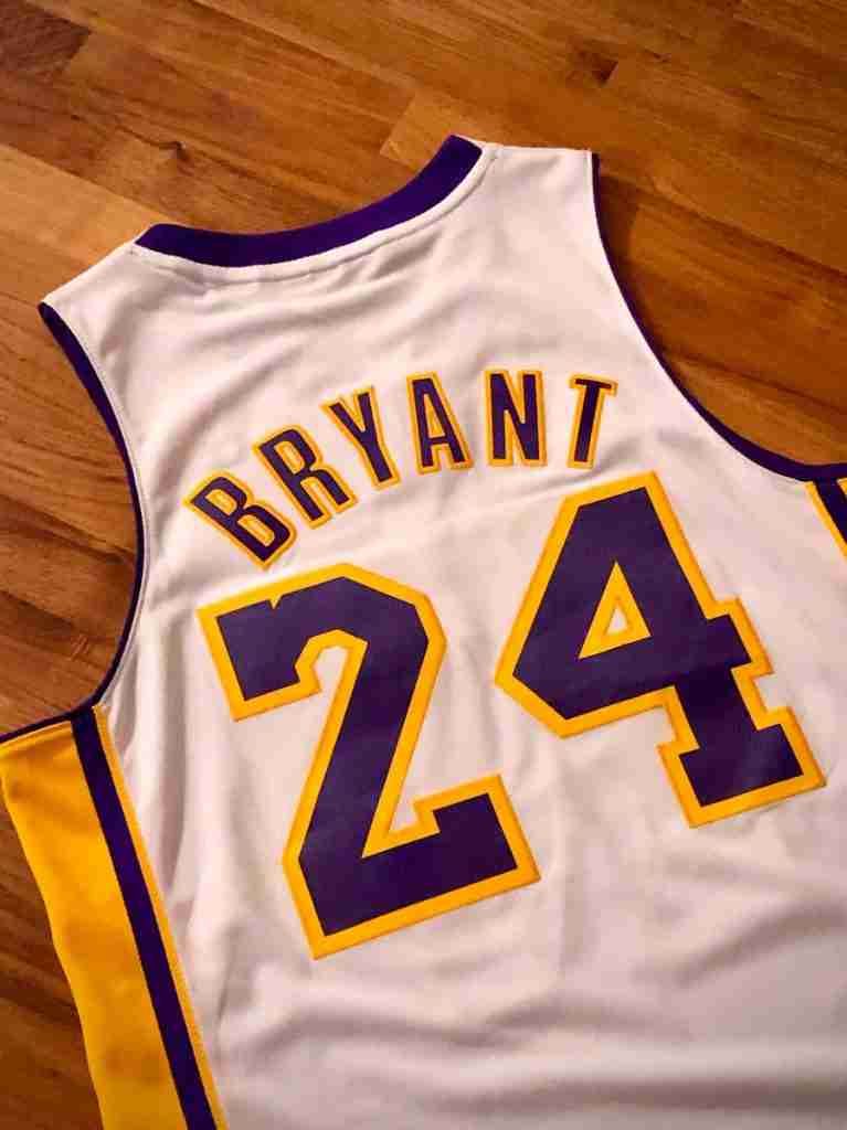 a basketball jersey with the number 24 on it : Fun Facts About Kobe Bryant