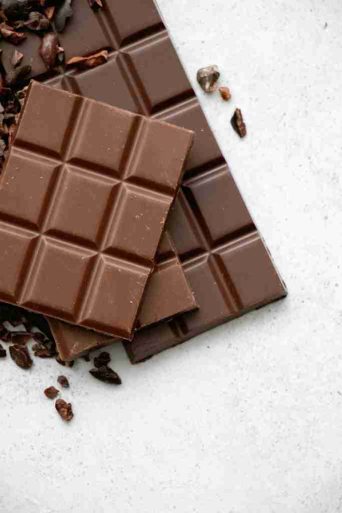 chocolate bar on white table : Fun Facts About Chocolate