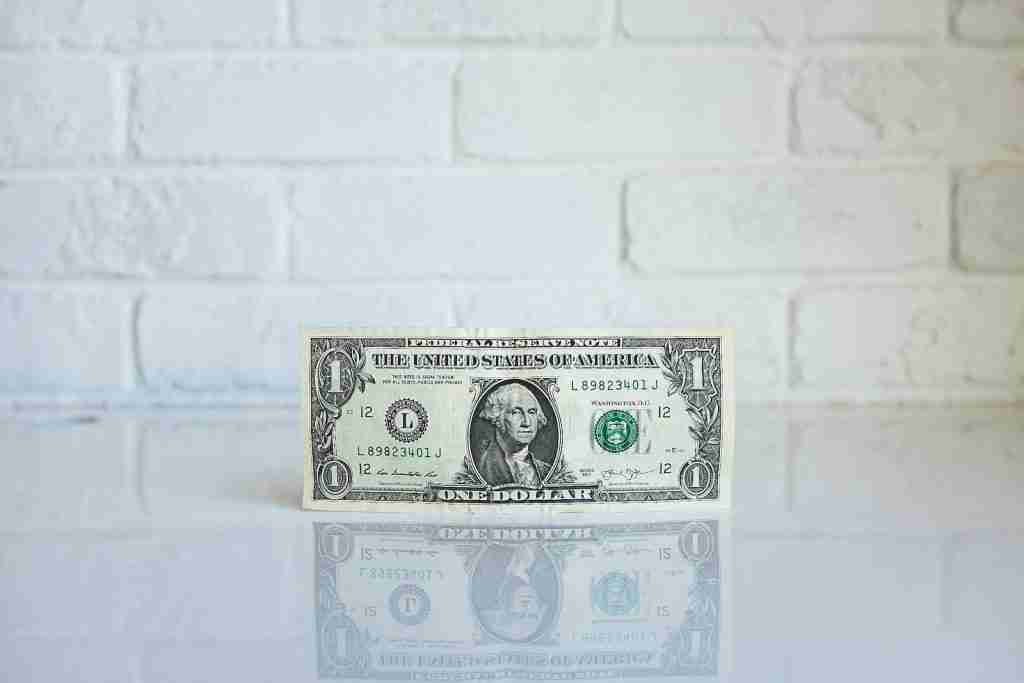 1 U.S. dollar banknote on white surface : Fun Facts About George Washington